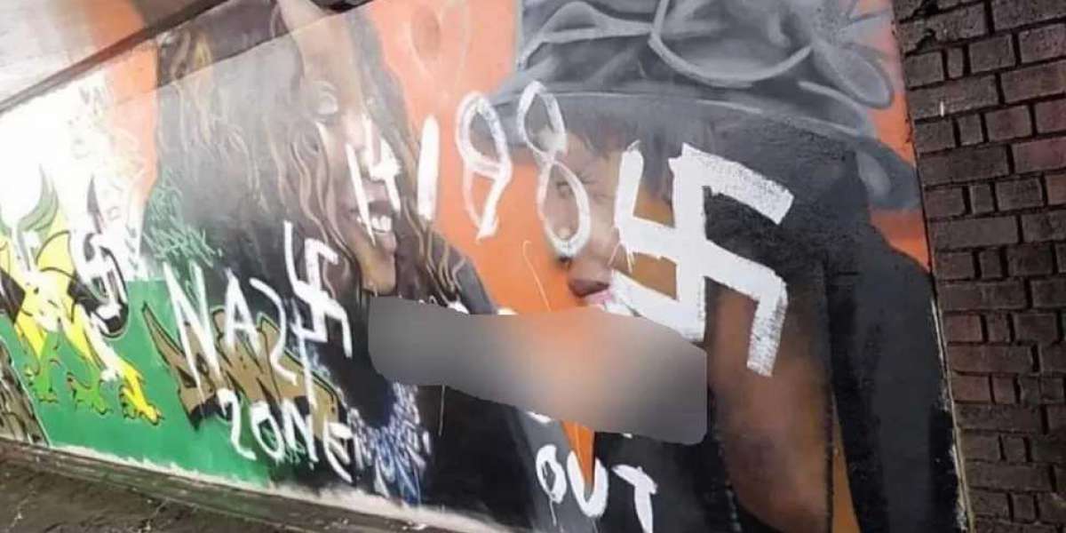 Teenagers arrested over Nazi graffiti on mural